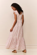 Pink floral maxi dress with tiered skirt and flutter sleeves