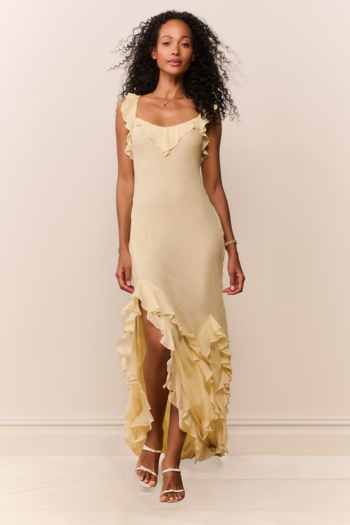 Butter yellow sleeveless chiffon maxi dress with ruffled layered skirt and V-neck