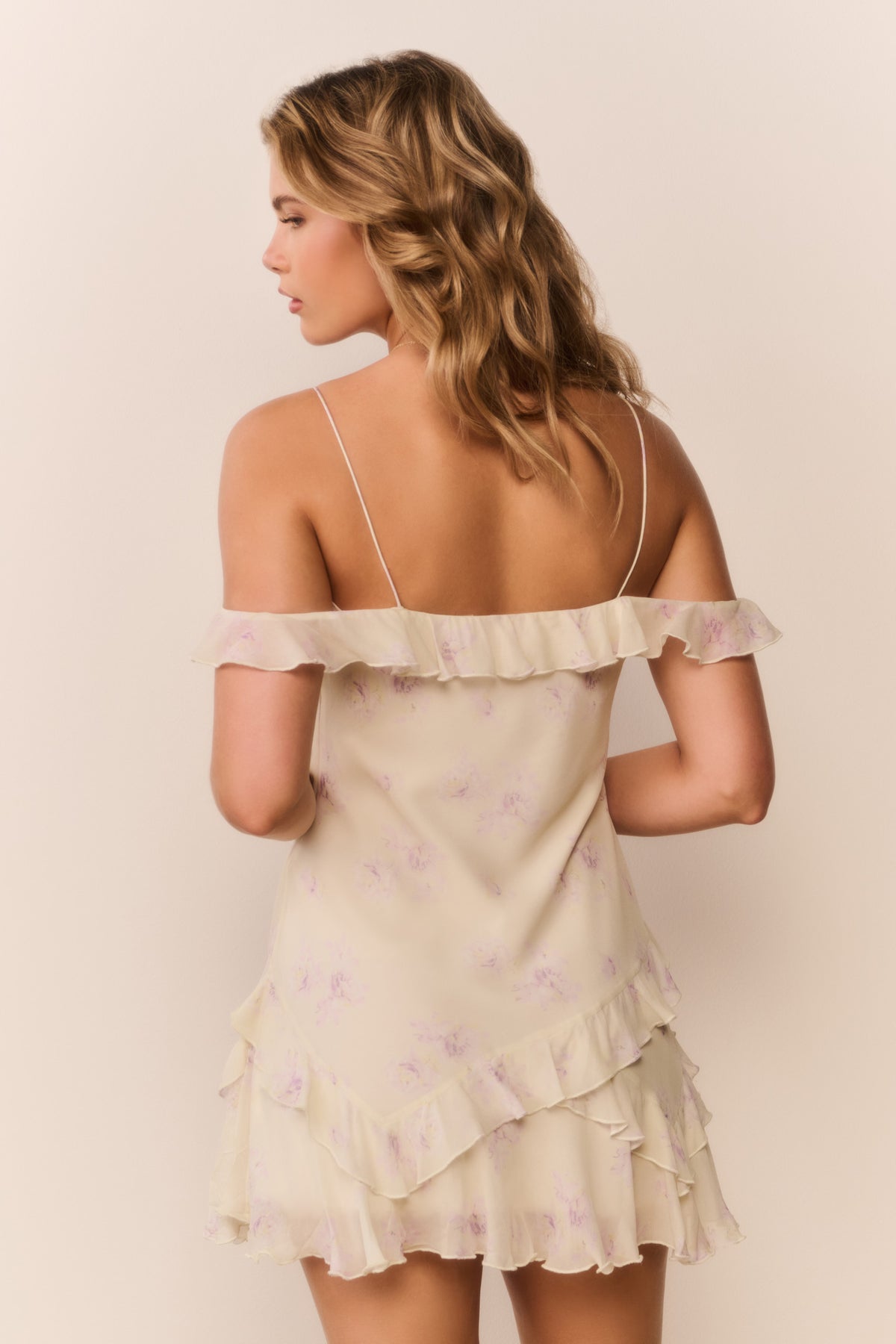 Floral chiffon mini dress, pale cream with ruffled back detail and tiered skirt