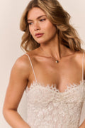 Ivory sequin lace mini dress bodice with spaghetti straps and floral lace texture