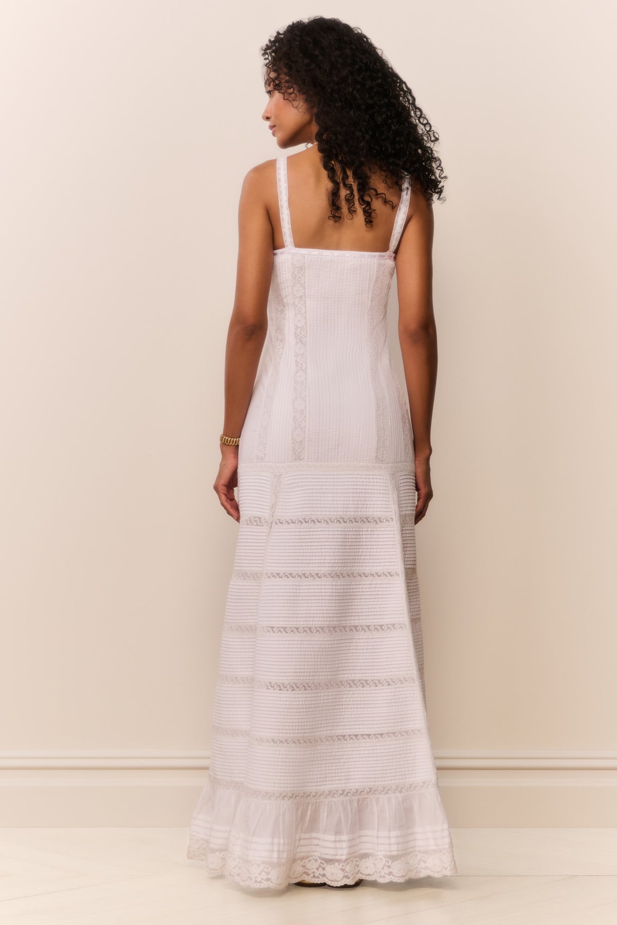 White cotton Victorian maxi dress, back view, with adjustable straps and tiered hem