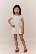 White pointelle knit girls dress with short sleeves and flared skirt