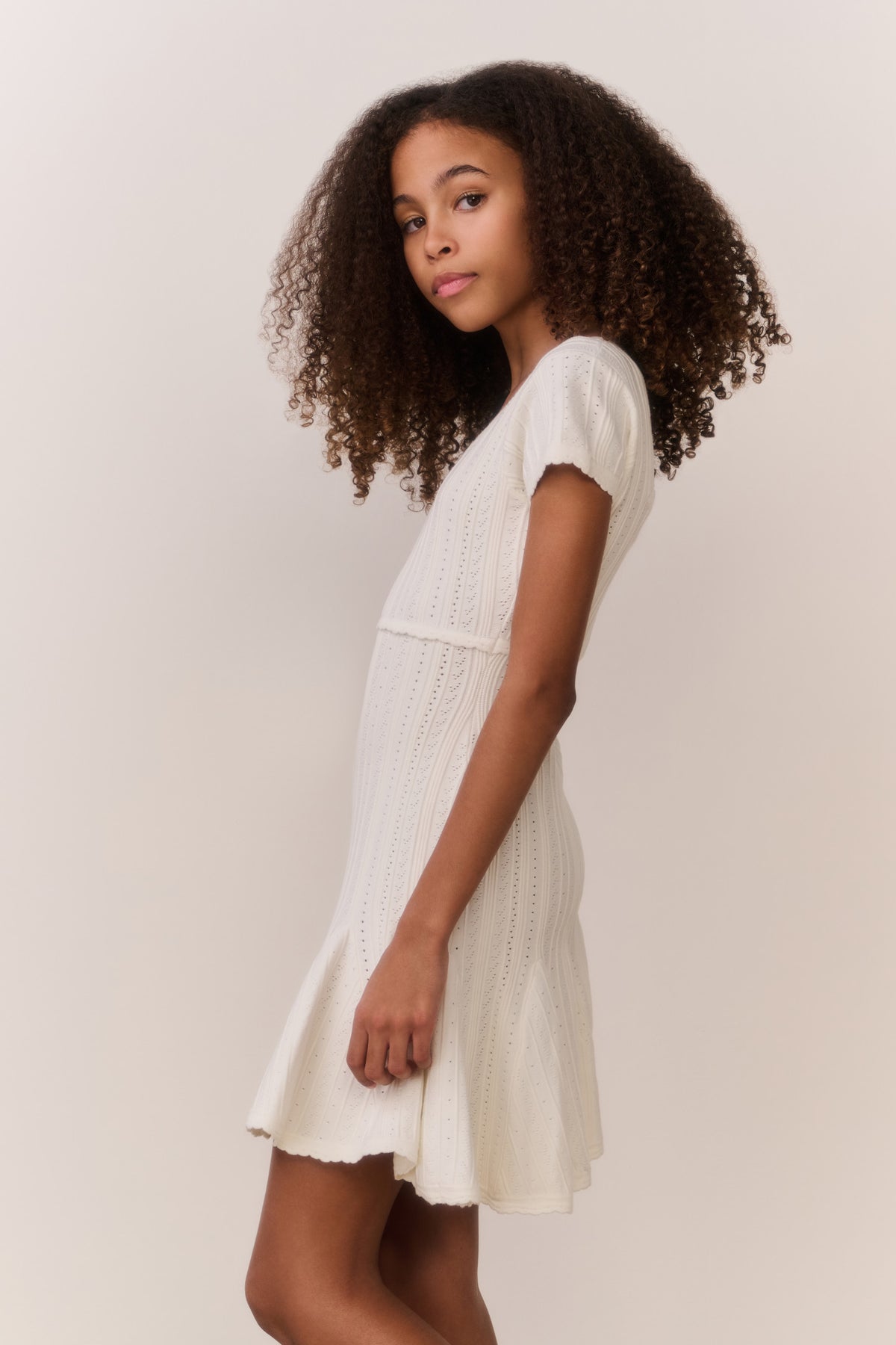 Tween pointelle stretch dress in white with short sleeves and soft flared hem