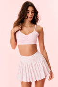 Pink printed active skort with pleated skirt and elastic gathered waist