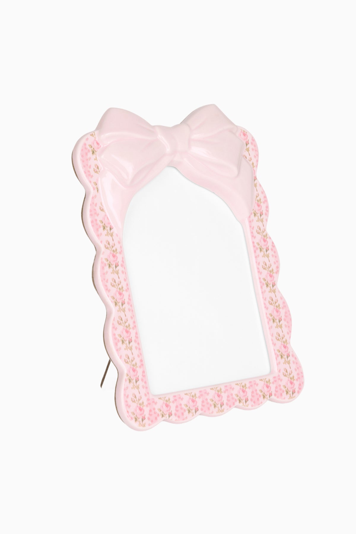 Pink floral decorative frame with satin bow and open photo window