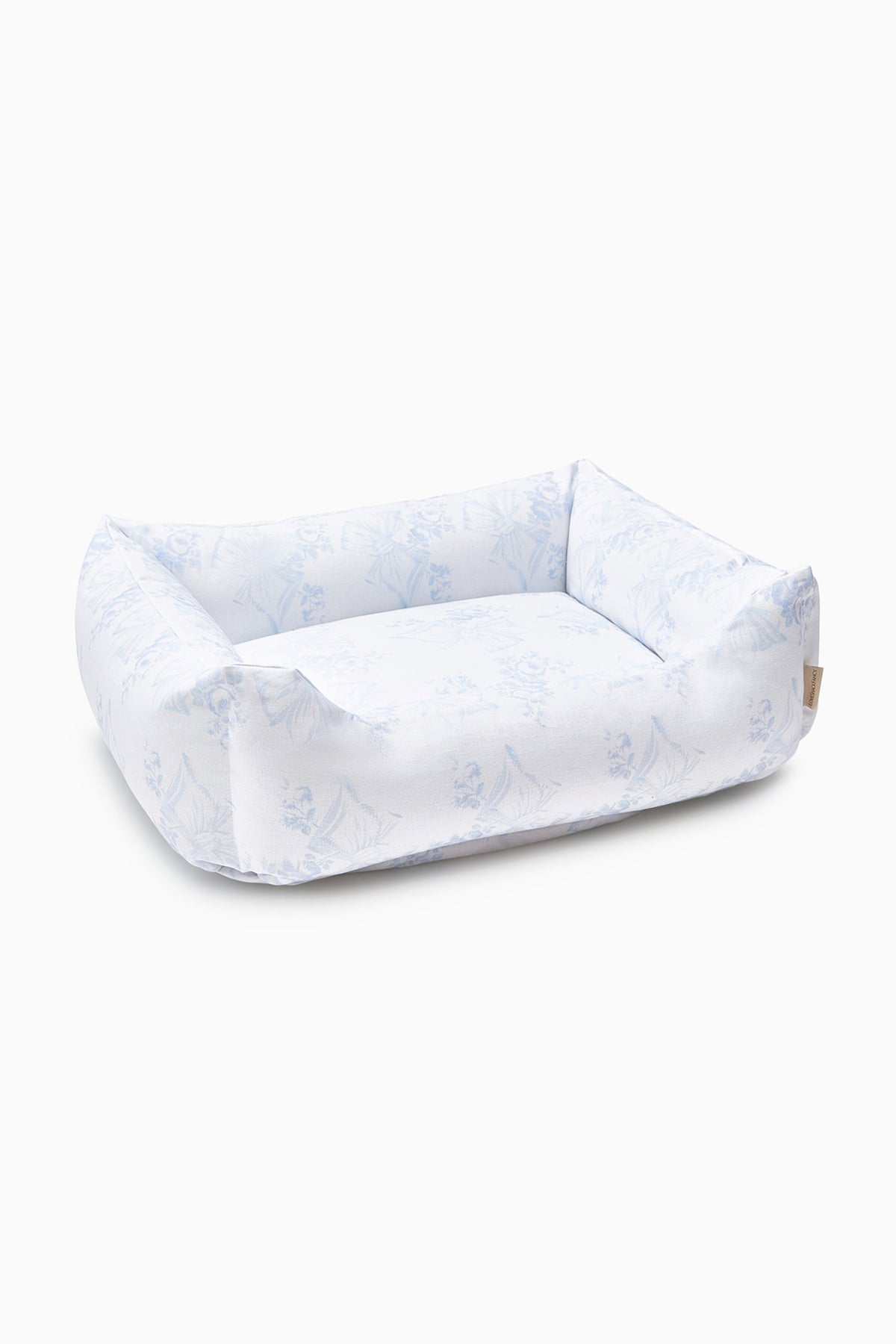 Light blue printed dog bed with padded bolsters, open center