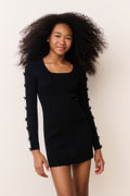 Black tween knit mini dress with square neckline and long sleeves lace-up trim