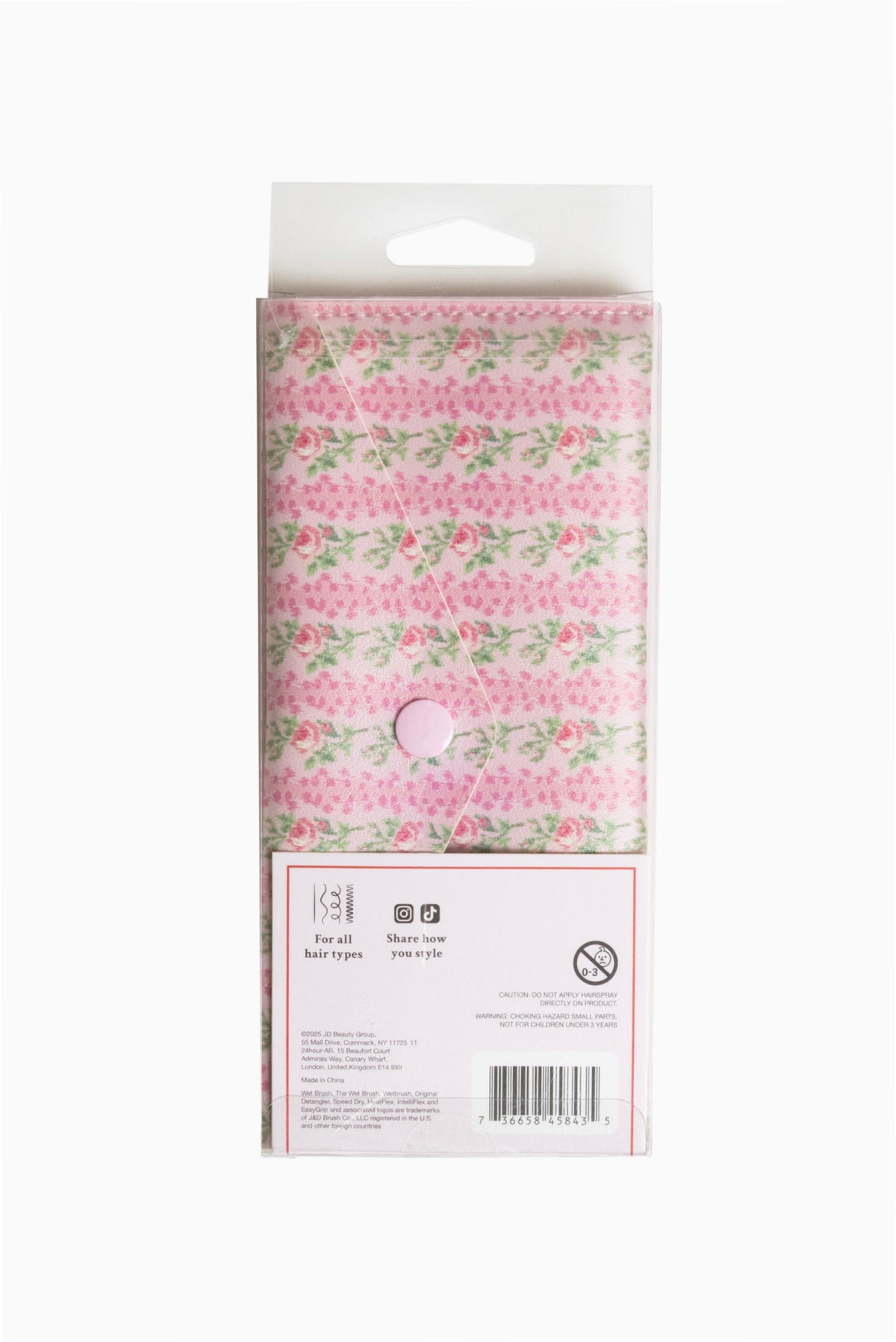 Floral hair comb in packaging case with pink and green leaf pattern