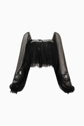 Black silk lace blouse flat lay with long sheer sleeves and lace yoke