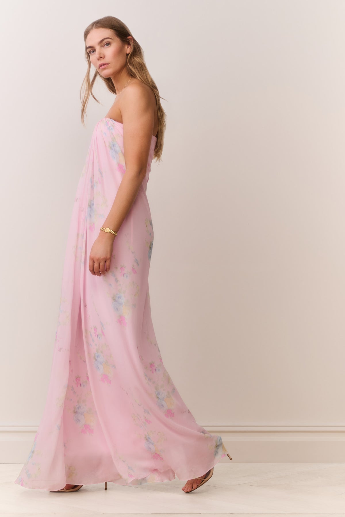 Strapless floral chiffon gown, light pink with pastel blossoms, side view
