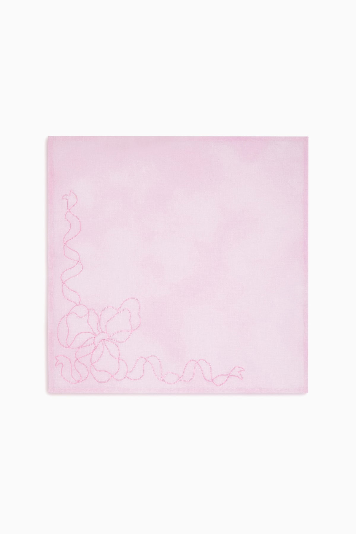 Embroidered linen bow napkin, pastel pink with corner flourish linework