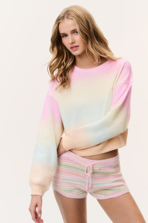 Ombre pullover sweatshirt on model, crew neck, long sleeves, pink-cream-blue