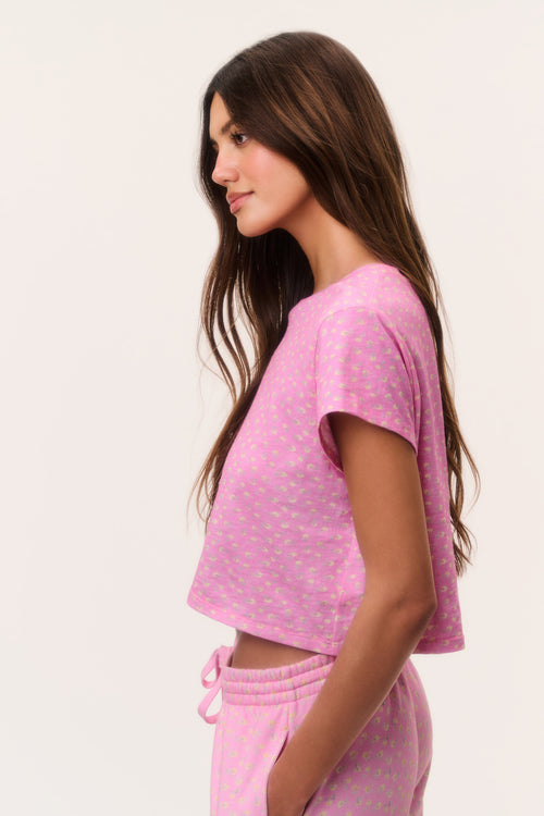Pink ditsy floral cropped tee with short sleeves, side view