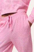 Pink ditsy floral sweatpants close-up of drawstring waist and gathered waistband