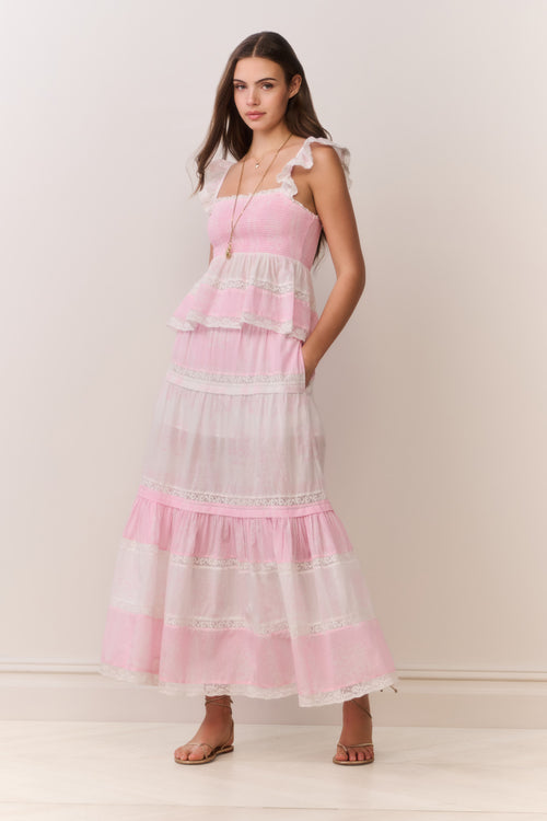 Pink tiered maxi skirt with ruffled bands and mixed print