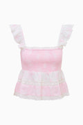 Pink peplum-style cotton top with lace-trim tiers and ruffled sleeves