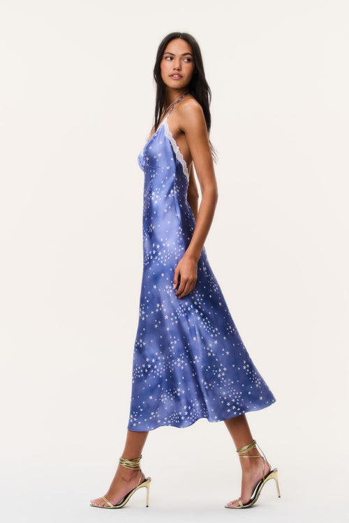 Sapphire star print midi slip dress with thin straps and flowing full skirt
