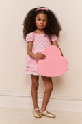 Girls pink heart-print top with puff sleeves and layered ruffle peplum hem