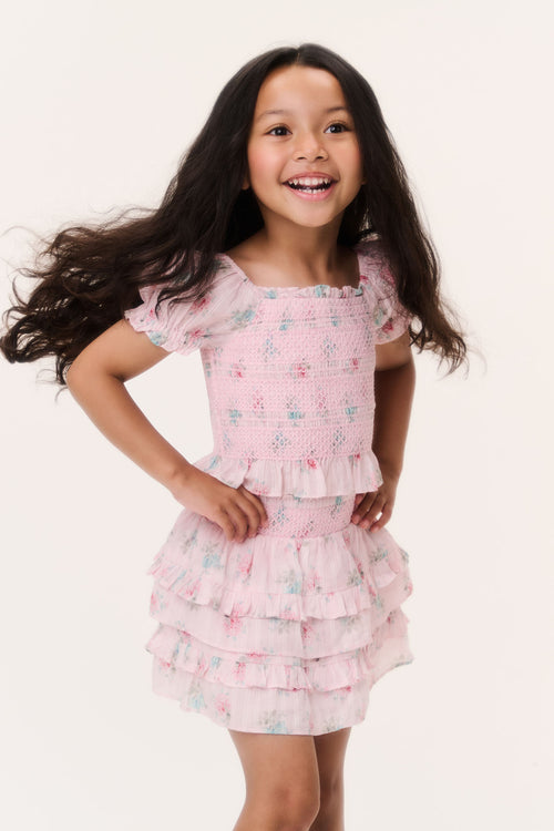 Girls pink ruffle blouse with puff sleeves and layered ruffle tier hem