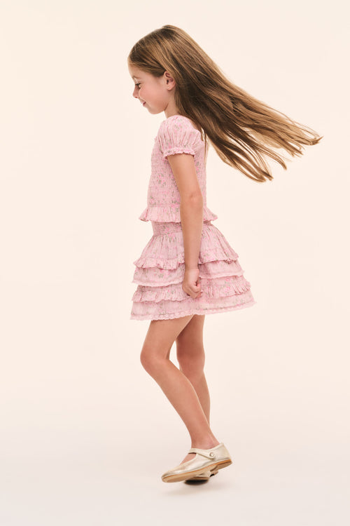 Girls' pink floral tiered ruffle top, back view with puff sleeves
