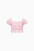 Girls pink square-neck ruffle blouse with puff sleeves, flat lay