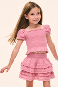 Girls’ pink square-neck smocked top with puff sleeves and ruffle-trim hem