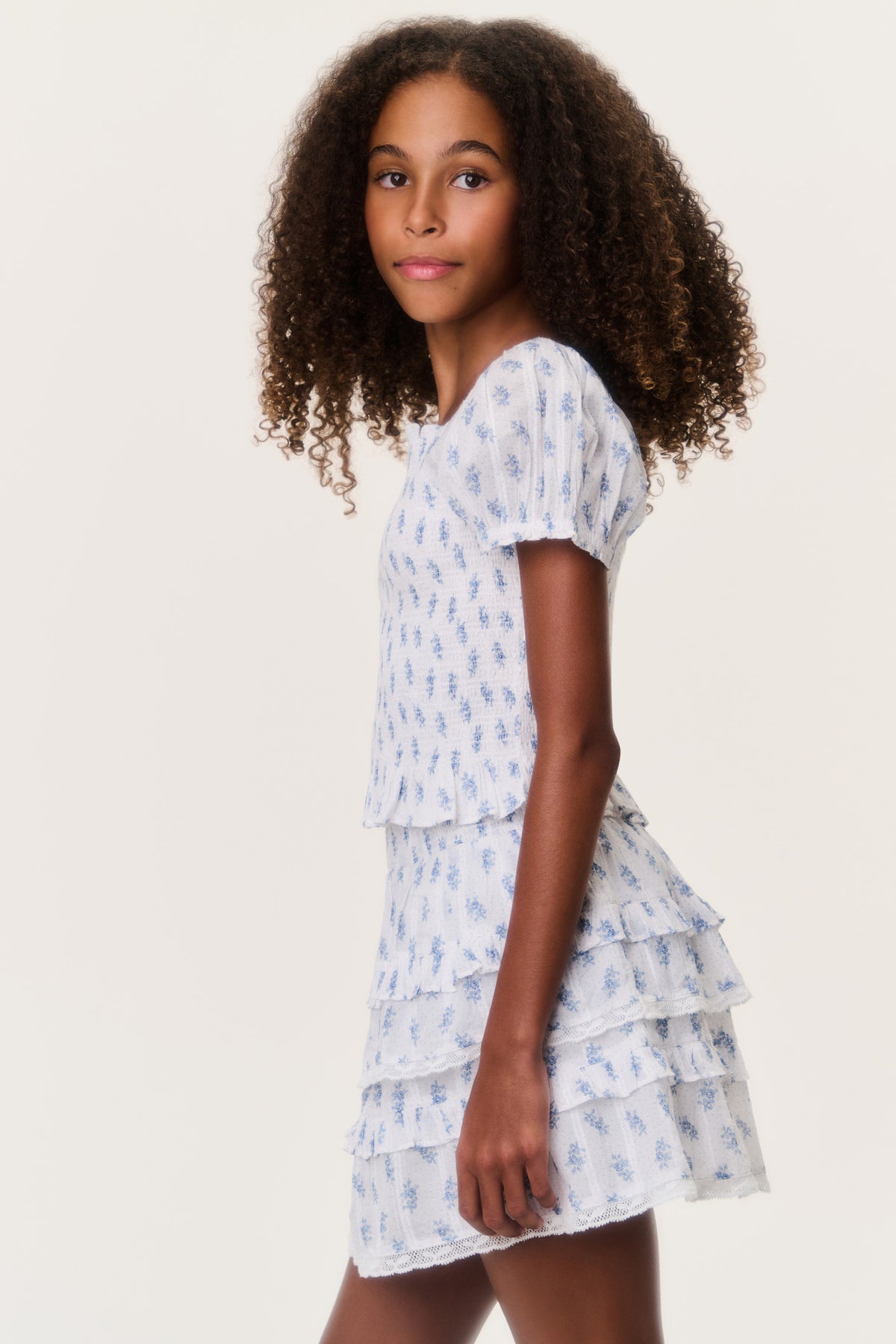 Light blue printed tiered ruffle mini skirt with short layered hem