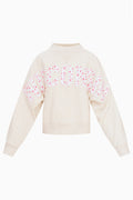 Cream long-sleeve mockneck crew top with “FANATICS” floral print panel across front