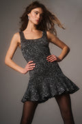Black sequin stretch mini dress, square neckline, flared skirt detail