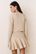 Gold sequin stretch knit cardigan back view, long sleeves, cropped hem