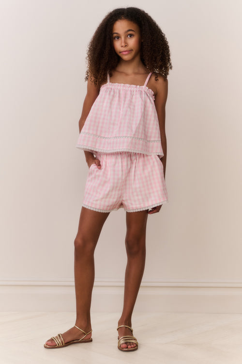 Pink gingham ruffle cami top with spaghetti straps and elastic smocked chest
