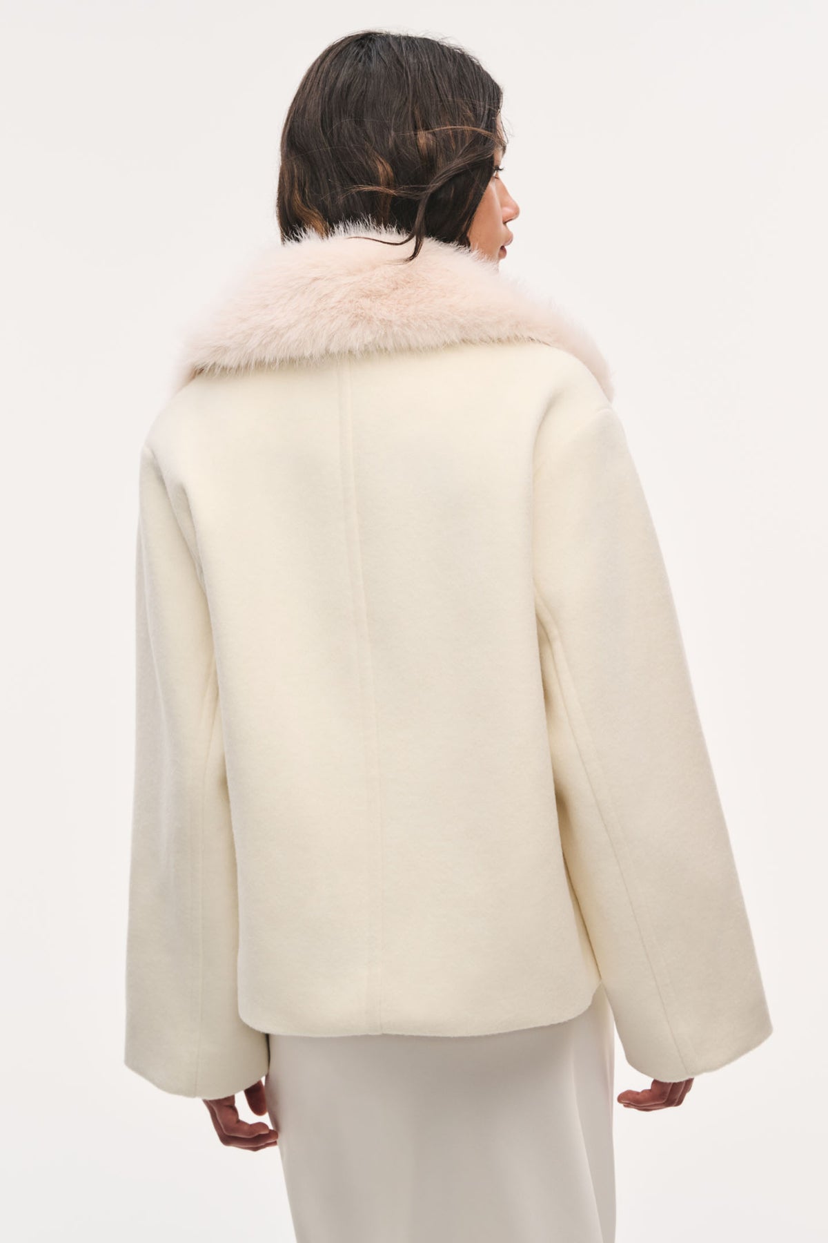 Winter white wool peacoat with faux fur collar, back view