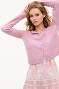 Rose-pink cashmere cardigan with button front and cropped sleeves