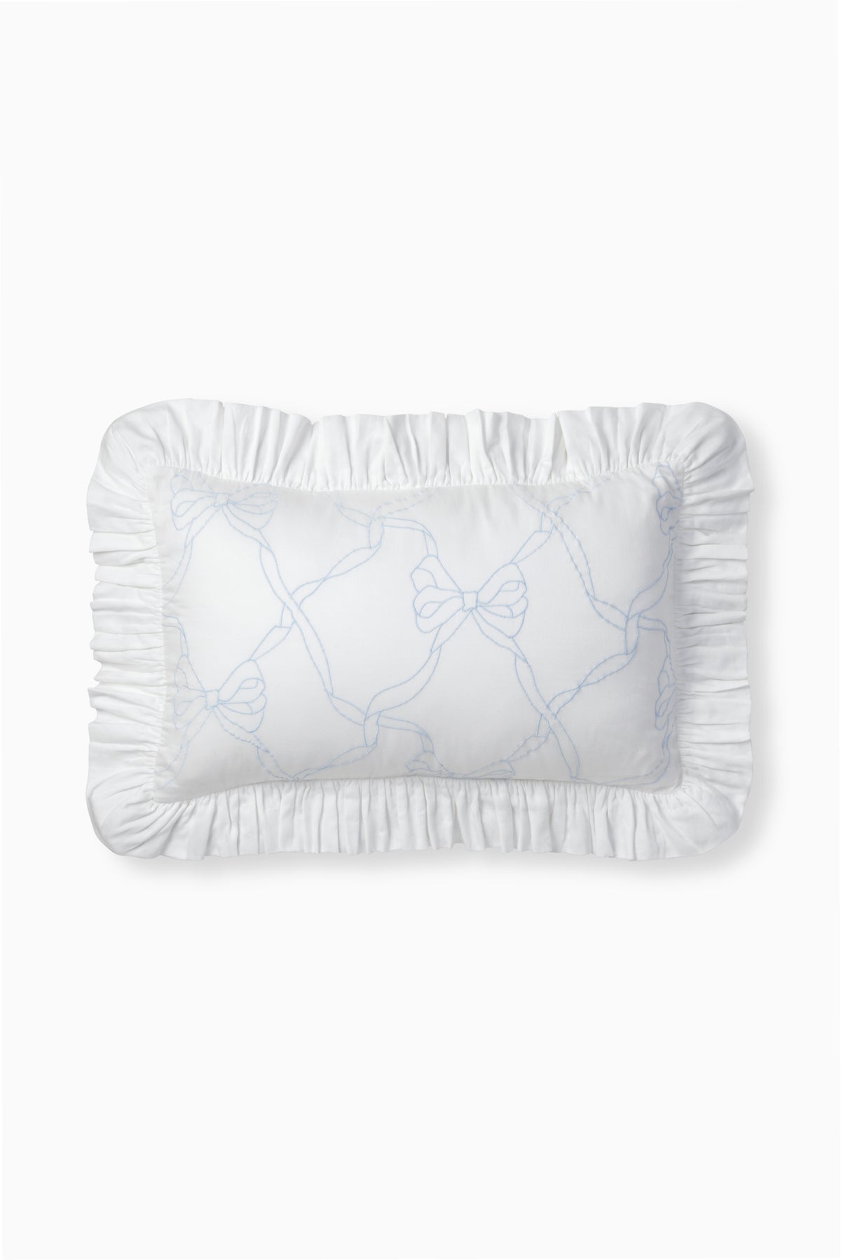 Morning mist throw pillow with ruffled edges and embroidered bow-and-vines design