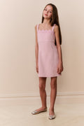 Pink sleeveless mini dress with lace ruffle neckline and fitted waist