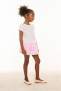 Girls pink tiered ruffle skirt with elastic waistband, side view