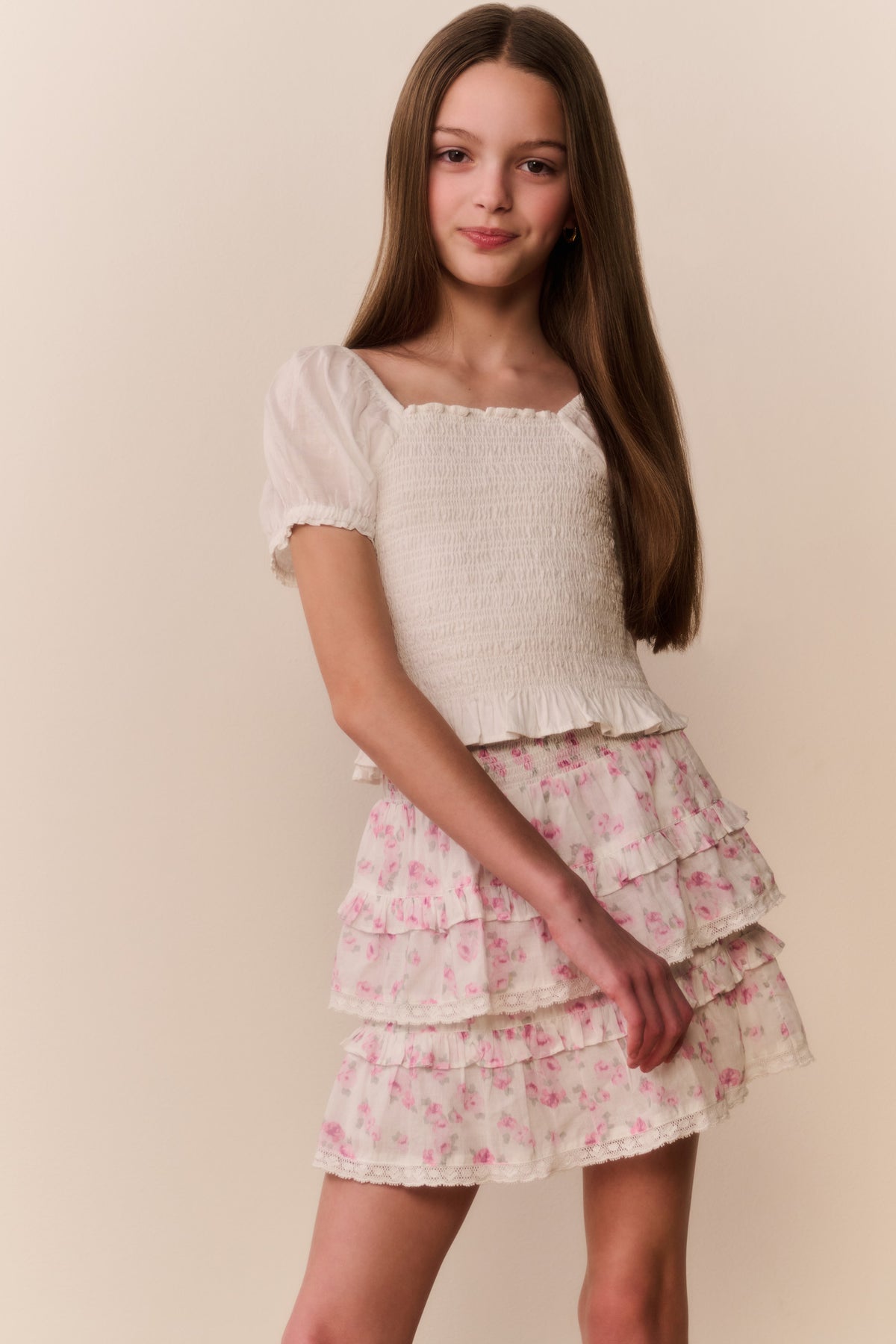 Light pink floral tiered ruffle skirt with layered tiers, front view