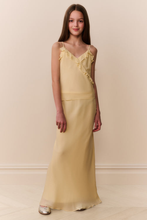 Butter lemon chiffon maxi skirt with straight, flowing drape and low hem