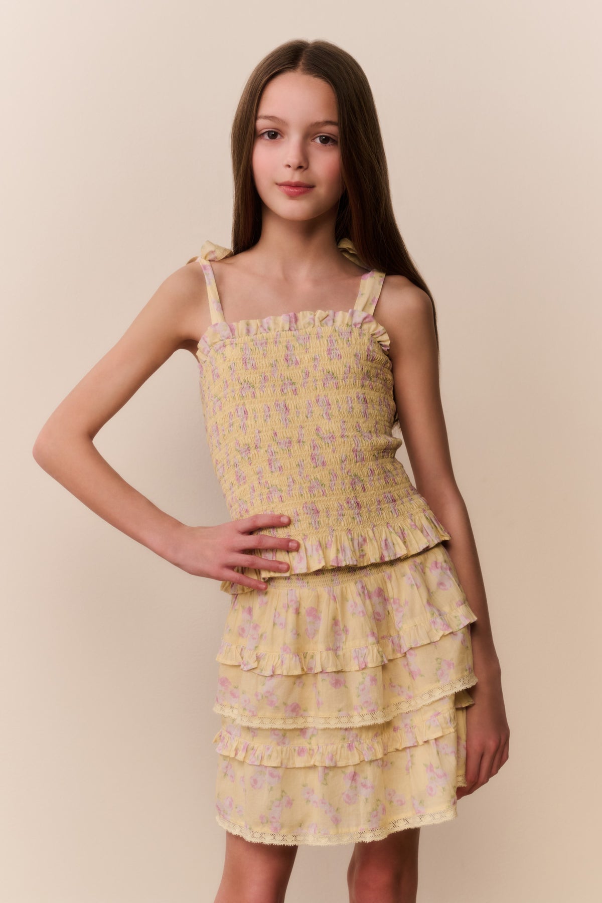 Lemon-yellow tiered ruffle skirt with small floral print, front view