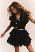 Black V-neck mini dress with short ruffle sleeves and tiered skirt layers, elastic waist