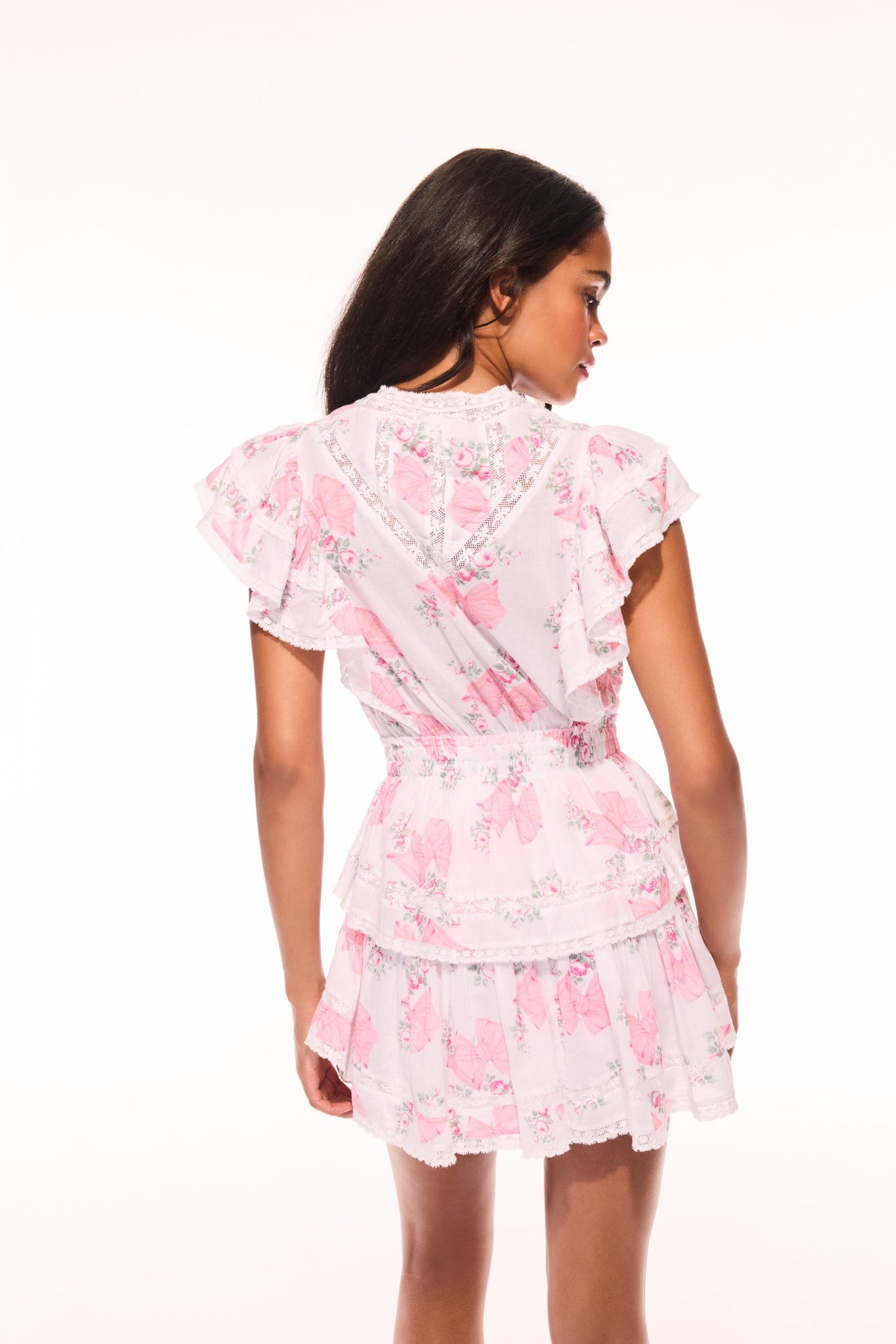 Pink floral print mini dress, V-back and tiered ruffle skirt with cap sleeves.