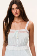 Light blue cotton mini dress with lace-trimmed square neckline and tassel button front