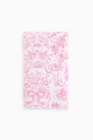 Pink cotton hand towel with all-over floral pattern