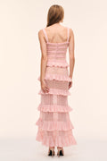 Back view of pink knit tier ruffle dress with lace panels and thin spaghetti straps