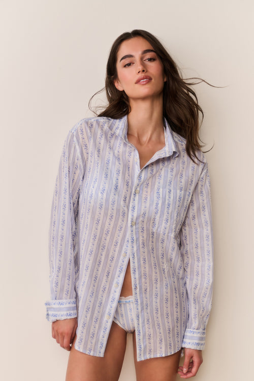 Light blue patterned cotton unisex shirt, button-up collar, long sleeves, front view
