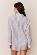 Light blue patterned cotton unisex shirt, button-up collar, long sleeves, back view