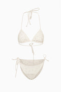Light blue ditsy floral bikini set with triangle halter top and side-tie bikini bottoms