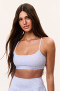 Light blue tennis-print sports bra with thin straps and supportive scoop front