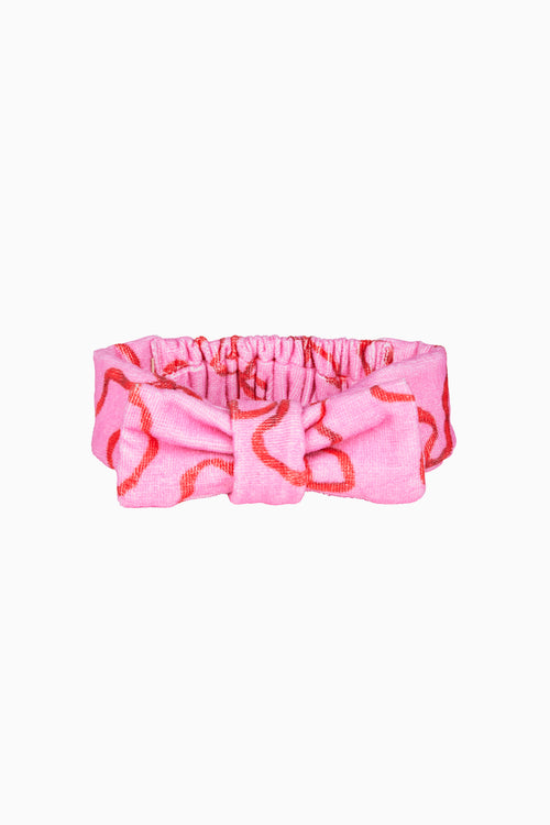 Pink bow print beauty headband with gathered center and top knot