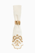 White napkin set of 4 with gold ribbon knot and embroidered winter motif